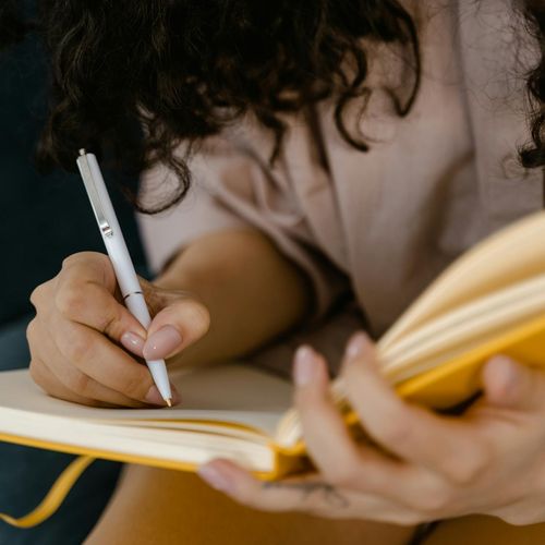 Woman working with data analytics on computer screen